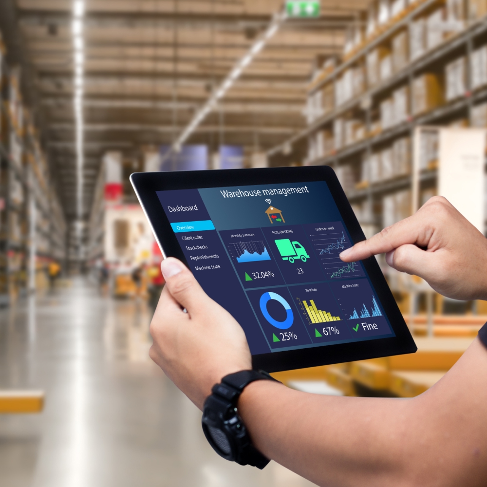 Person using tablet for warehouse inventory management