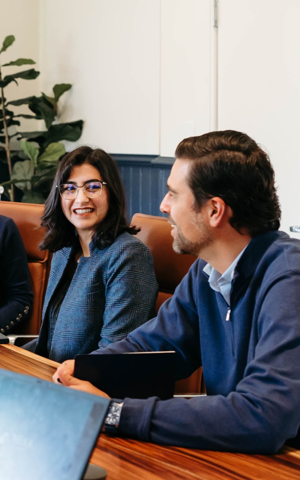 Colleagues discussing during a business meeting